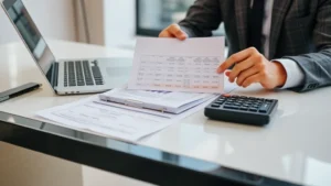 can you have estimated taxes autodrafted - A professional accountant or financial advisor reviewing quarterly tax documents